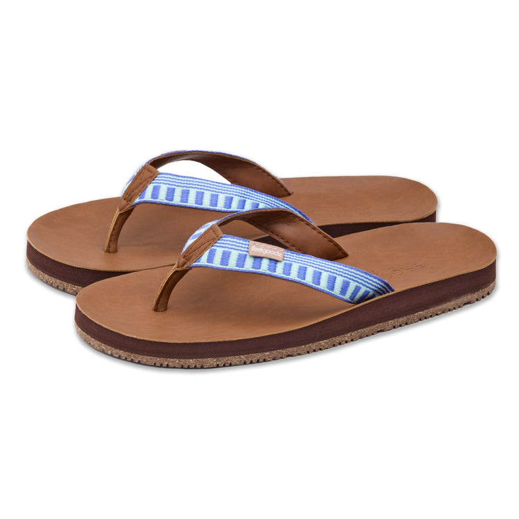 Pair of brown sandals with blue striped straps on a white background