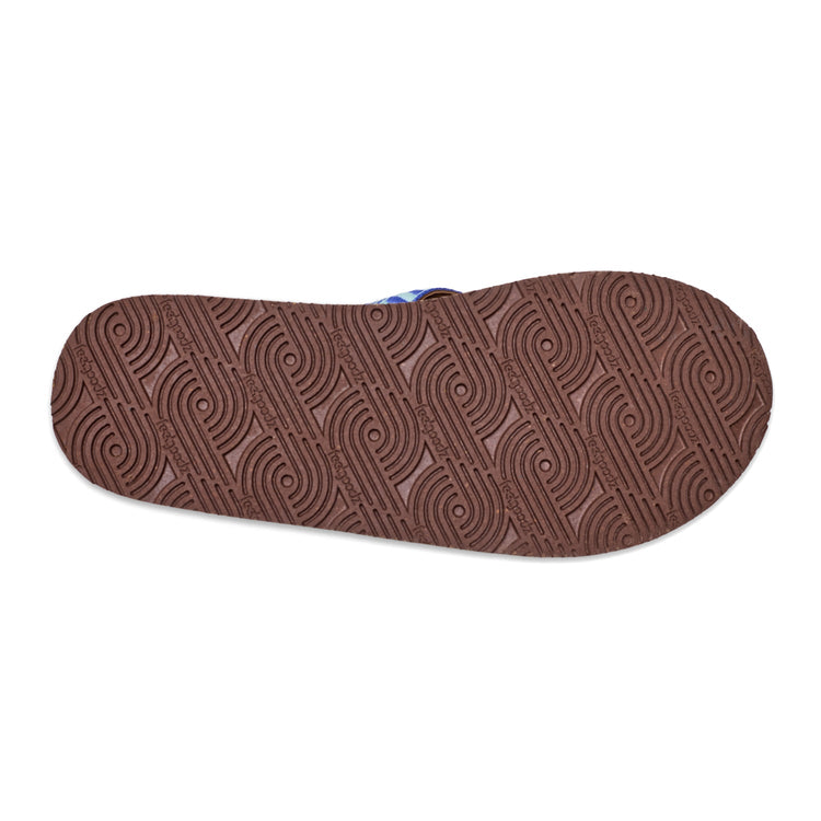Brown shoe sole with wavy pattern on a white background