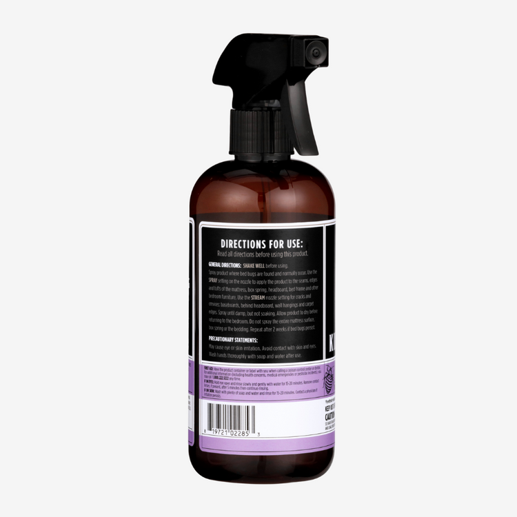 Brown spray bottle with a label on a white background