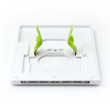 A white 2-pack of GuideLight outlet cover plates with built-in LED lights, mounted on a blue wall with the outlets visible at the bottom.