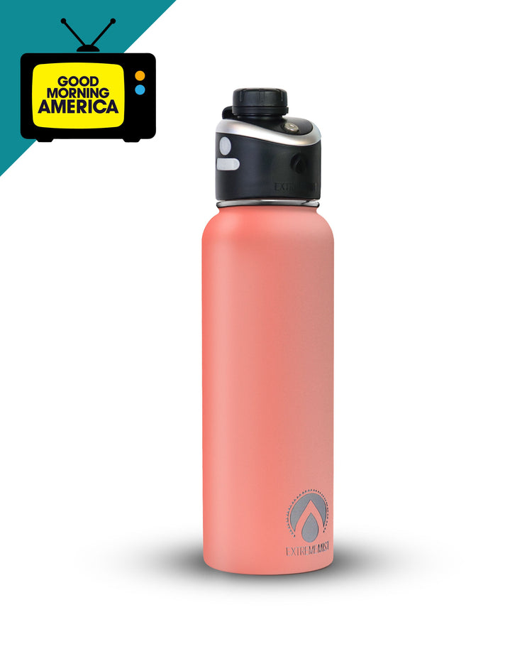 Coral water bottle with black cap on a white background, featuring 'Good Morning America' logo.