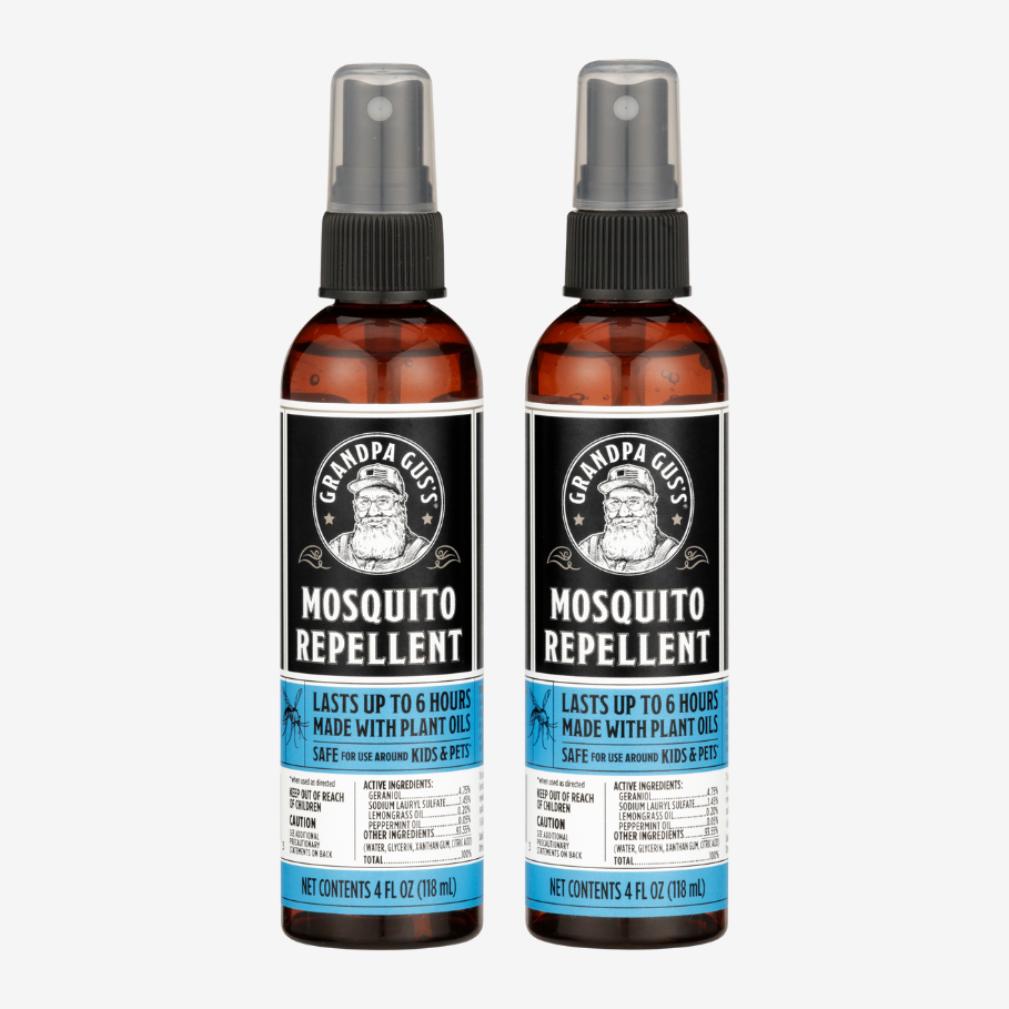 Two bottles of Grandpa Gus' Mosquito Repellent on a white background