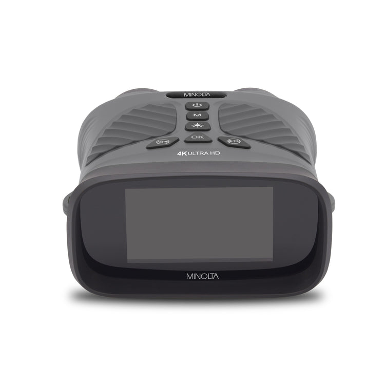 Gray Minolta camera on a white background