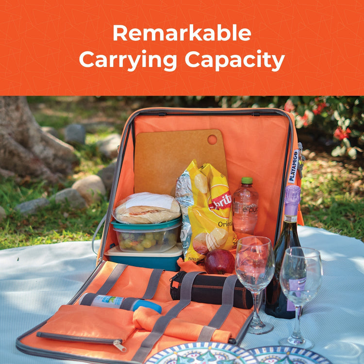 Orange picnic basket with food and drinks on a table outdoors, text 'Remarkable Carrying Capacity'.