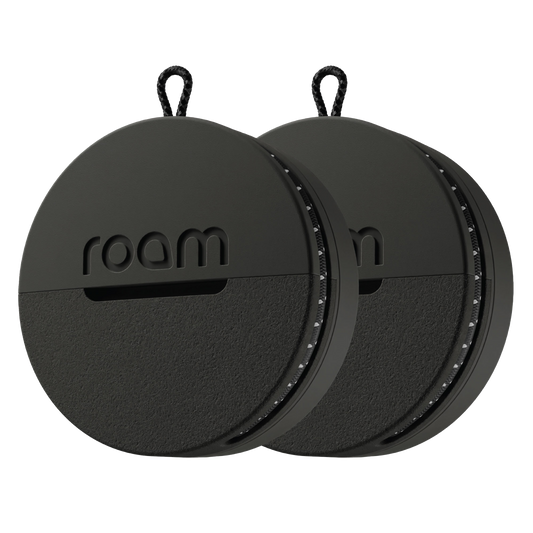 Two black circular devices with 'roam' branding on a white background