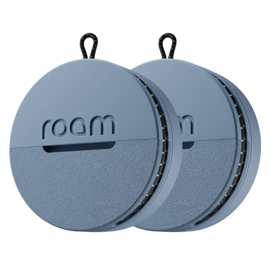 Two blue circular devices with 'roam' branding on a white background