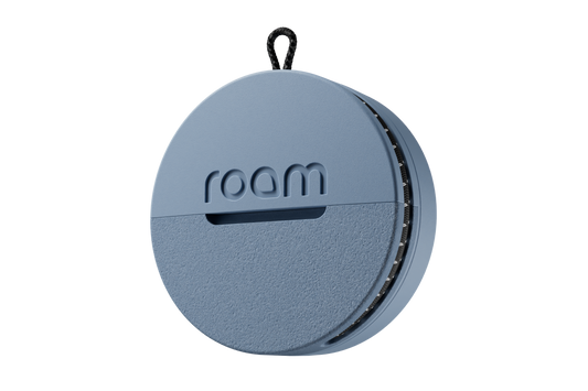 Round blue device with 'roam' branding on a white background