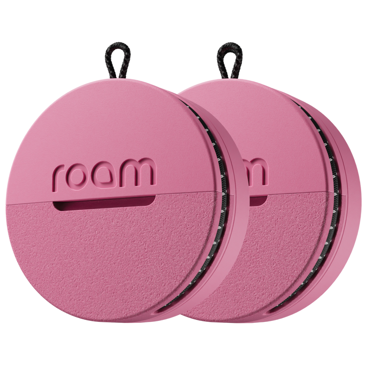 Pink circular device with 'roam' branding on a white background