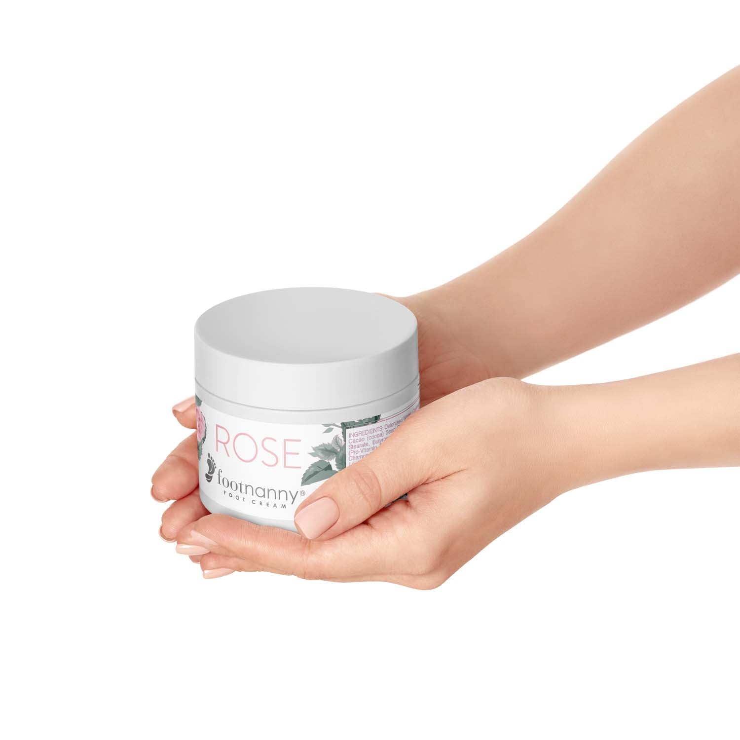 Person holding a jar of 'Rose' toothpaste against a white background