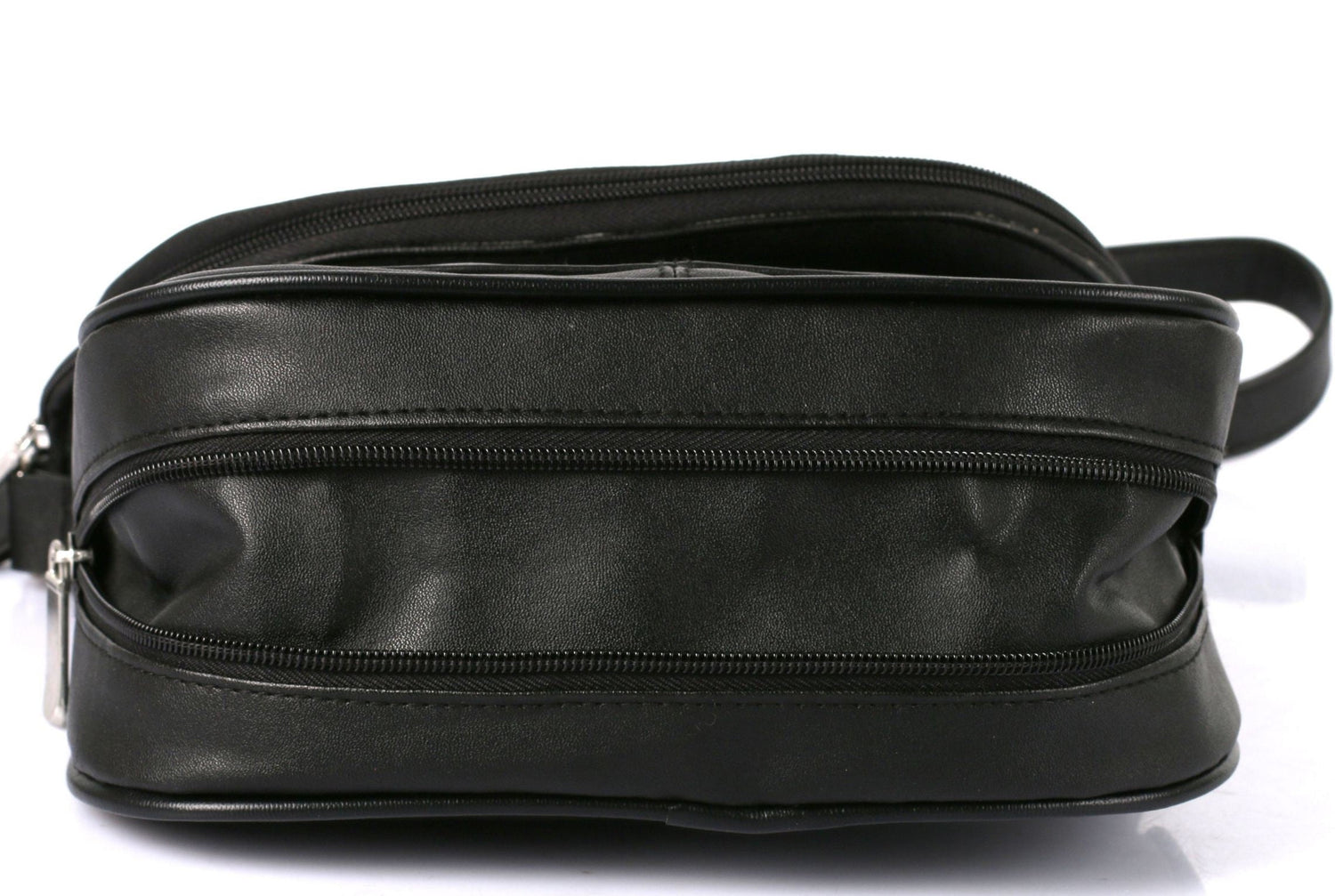 Black leather bag with zippers on a white background
