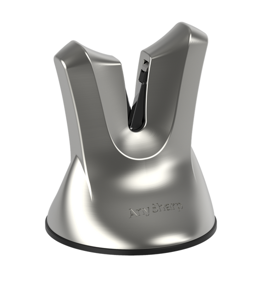 A black, professional knife sharpener with a suction cup base and a metallic blade.