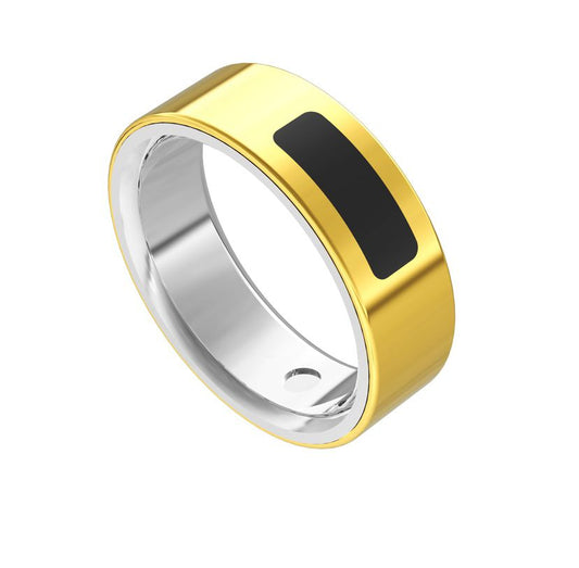 Gold and silver ring with a black rectangular component on a white background
