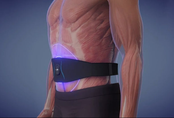 Black electronic device on a person's back with a detailed muscle model background
