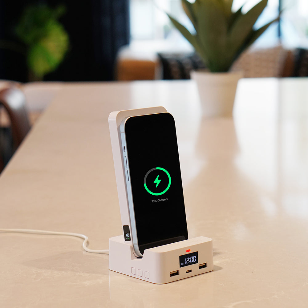 Phone charging station with smartphone on a table