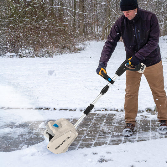 Snow brush with bristle attachment on a white background