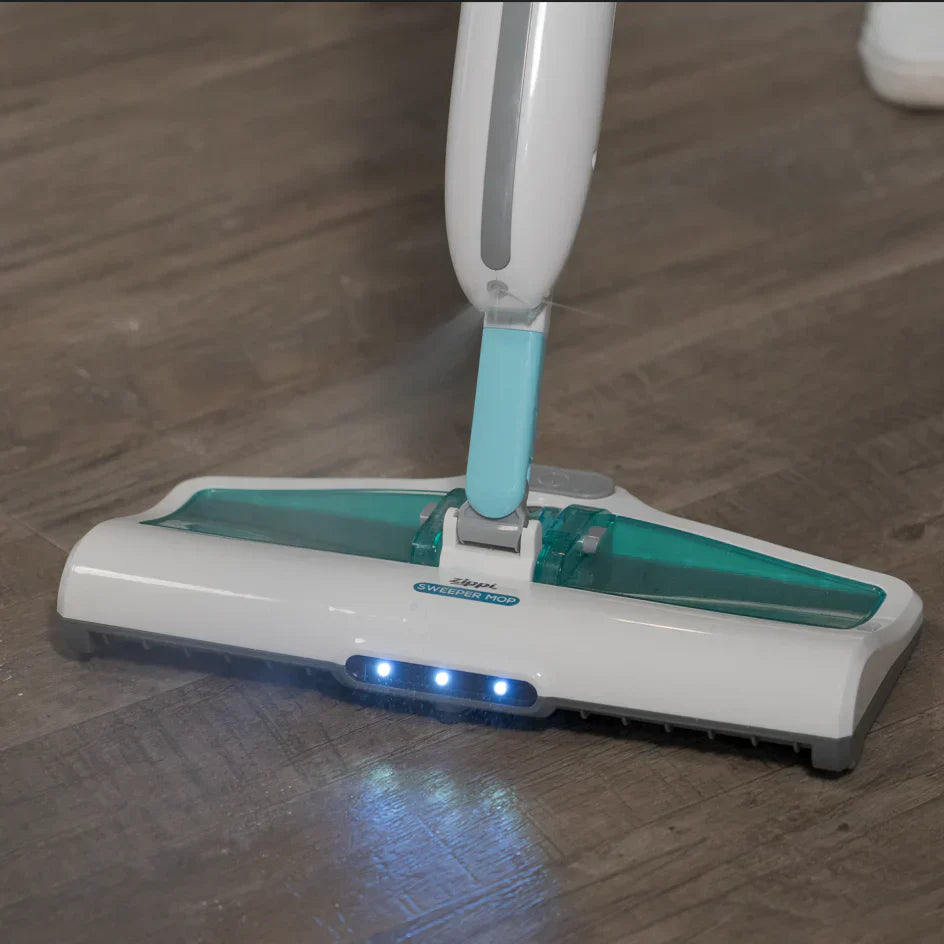 Mop cleaning a wooden floor with visible brand logo