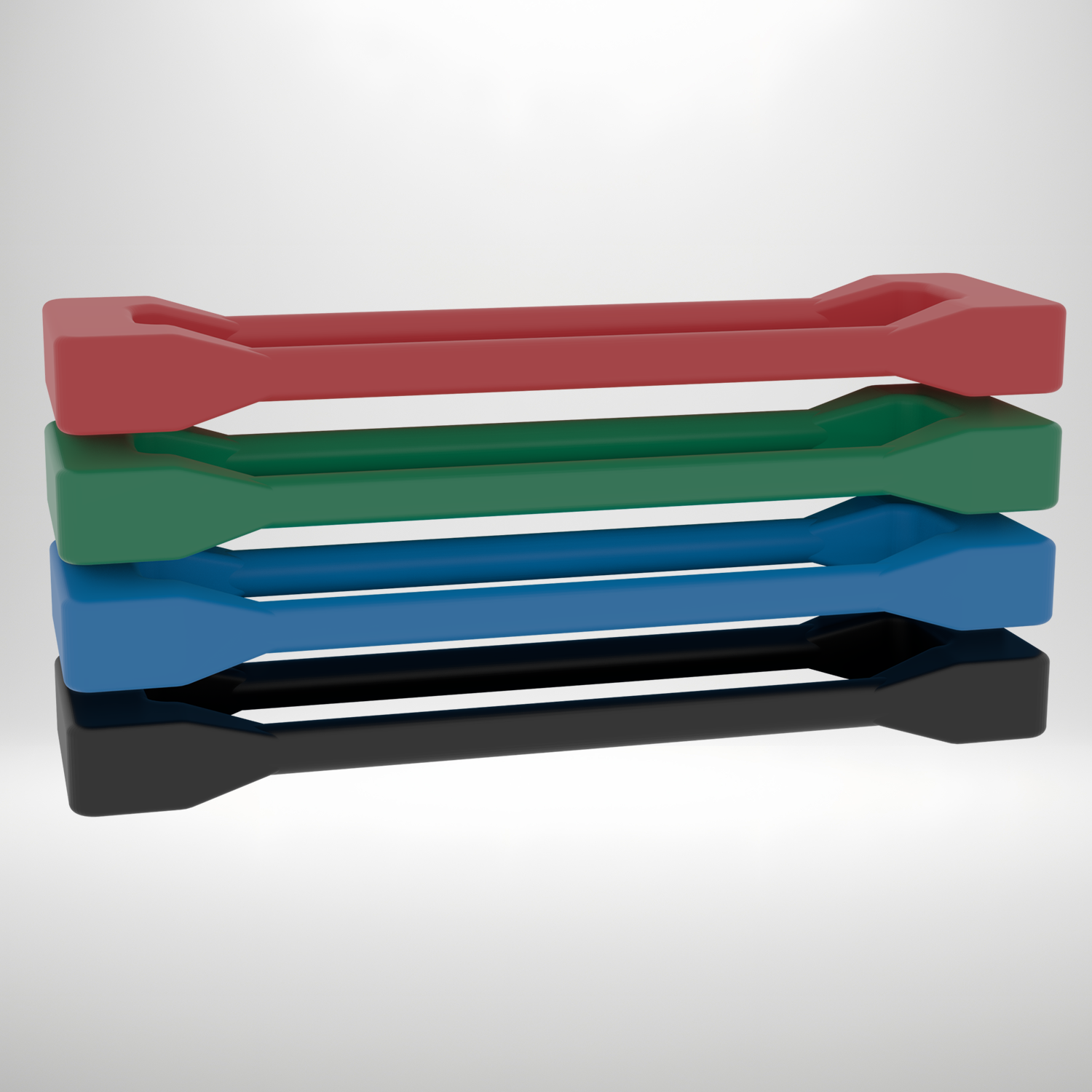 Stack of colorful plastic trays on a white background