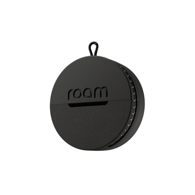 Roam smart tracker professional black single unit with 'roam' branding on transparent background, side angle view showing circular GPS tracker
