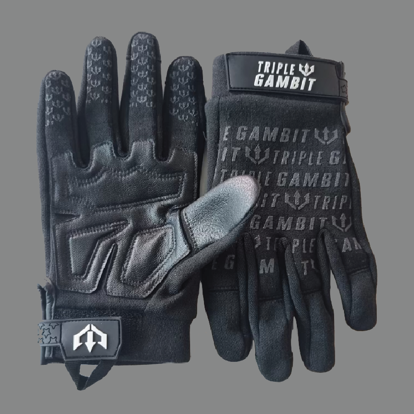 Black gloves with 'Triple Gambit' branding on a gray background