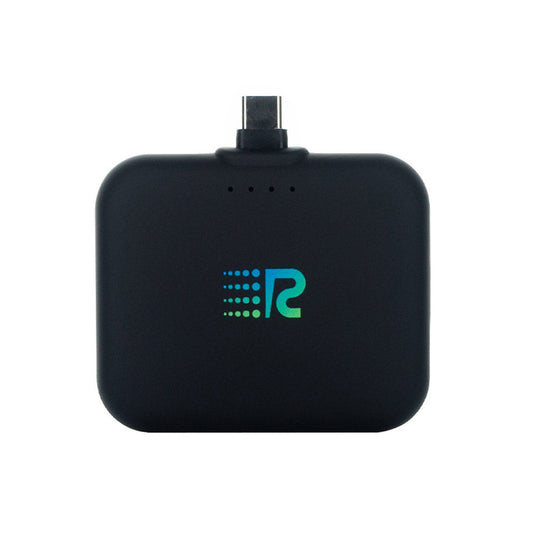 A compact and portable black charger with a logo on the front, featuring a single charging port.